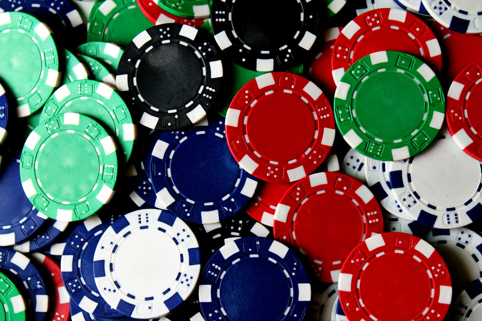 A pile of colourful casino chips